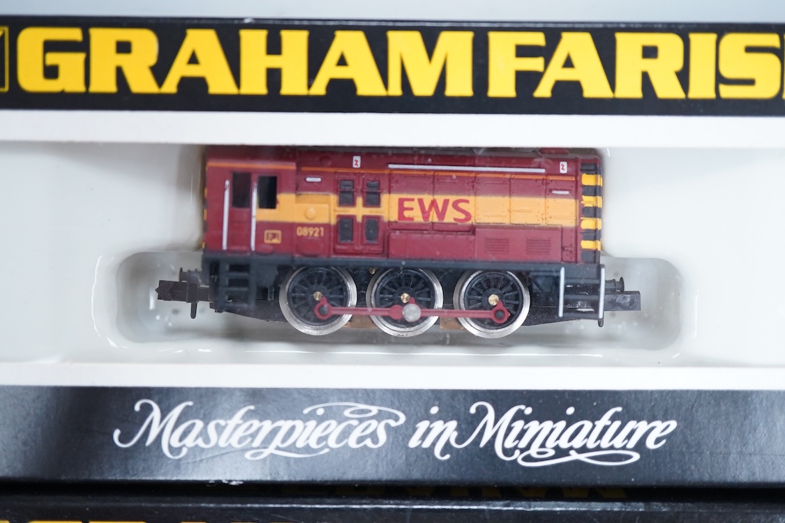 Four boxed Graham Farish N gauge railway Class 08 0-6-0 diesel locomotives; a BR, D3729 (371-001), a BR Railfreight, 08 834 (1008), an EWS, 08921 (100G) and a Thomas 1, 08500 (1006).